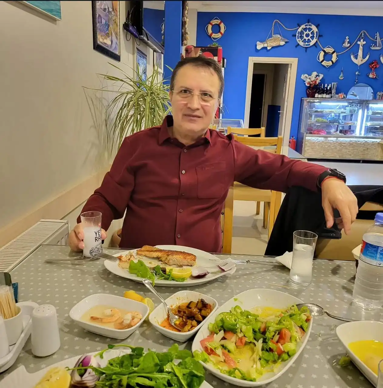 Samad enjoying a homemade-style meal