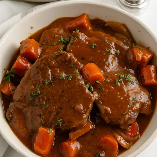 Crock Pot Swiss Steak served with mashed potatoes and green beans