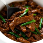 Slow Cooker Mongolian Beef with rice, sesame, and scallions
