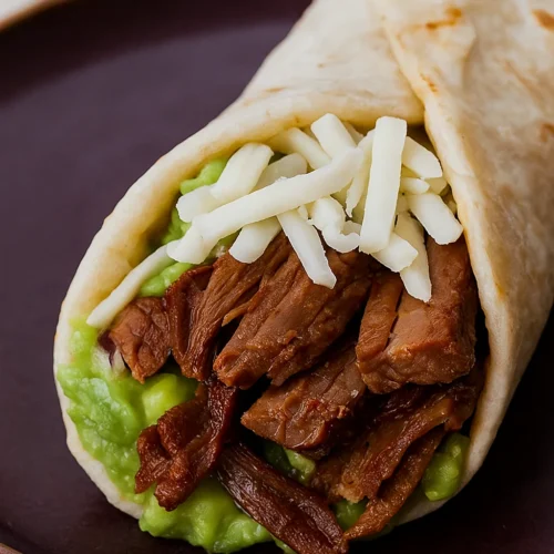 Slow cooker shredded beef tacos with toppings